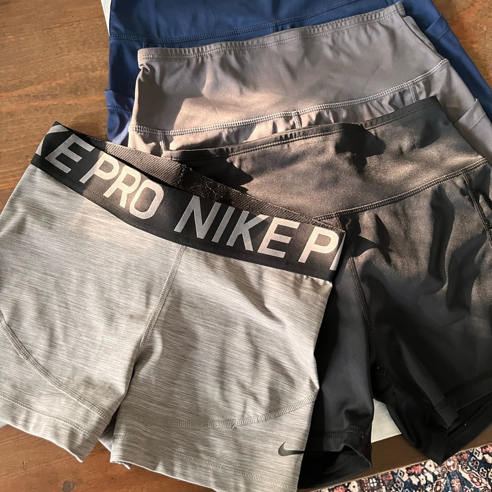 Nike Pro Women's Shorts Trio - Gray, Black selling all 4 pairs 1 pair is Nike